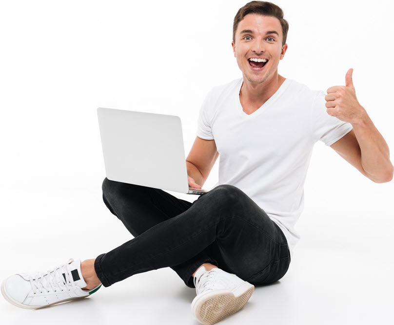 portrait-of-happy-excited-man-holding-laptop-computer